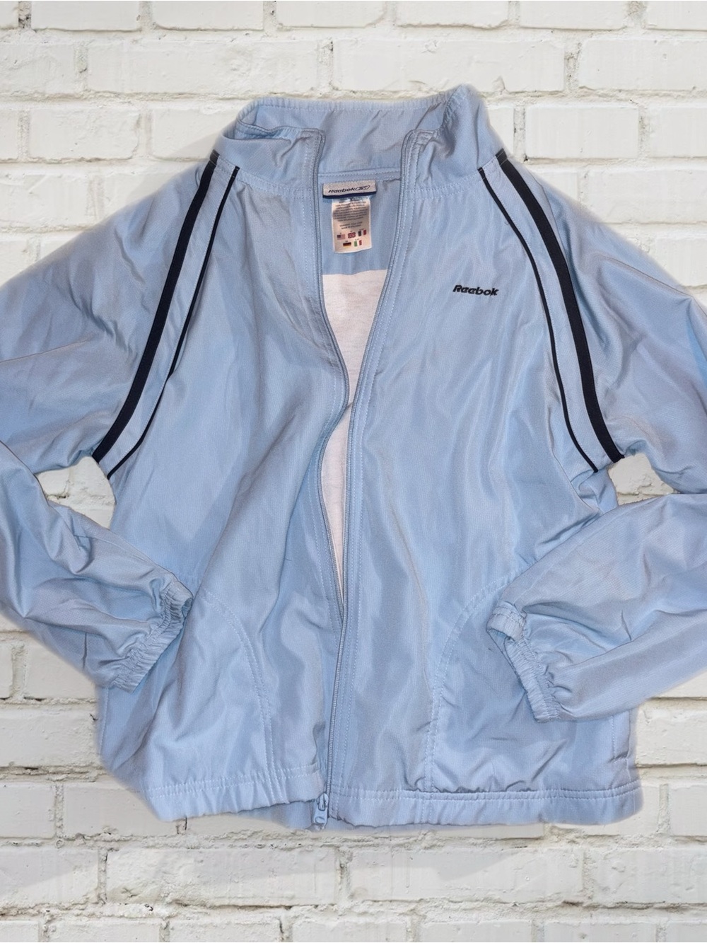 Vintage 90s Reebok Women's Light Blue Track Jacket Windbreaker Bomber